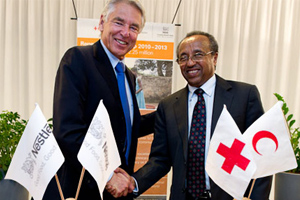 Peter Brabeck-Letmathe and Bekele Geleta shaking hands