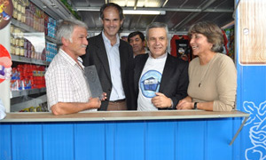 People standing inside the new shop