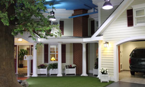 Infront of the replica house at the Purina Learning Center in the United States 