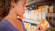 Consumer reading a Quicklunch label