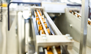 Nespresso capsules on production line