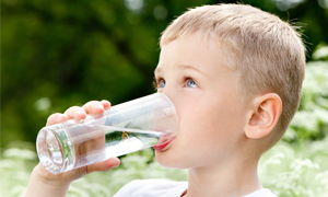 A boy drinking water