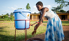 woman washing her hands