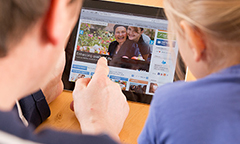 family using a tablet