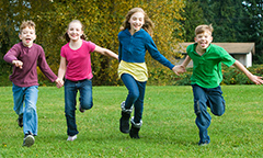 running children in a field