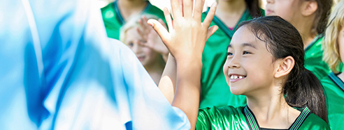Girl giving high five