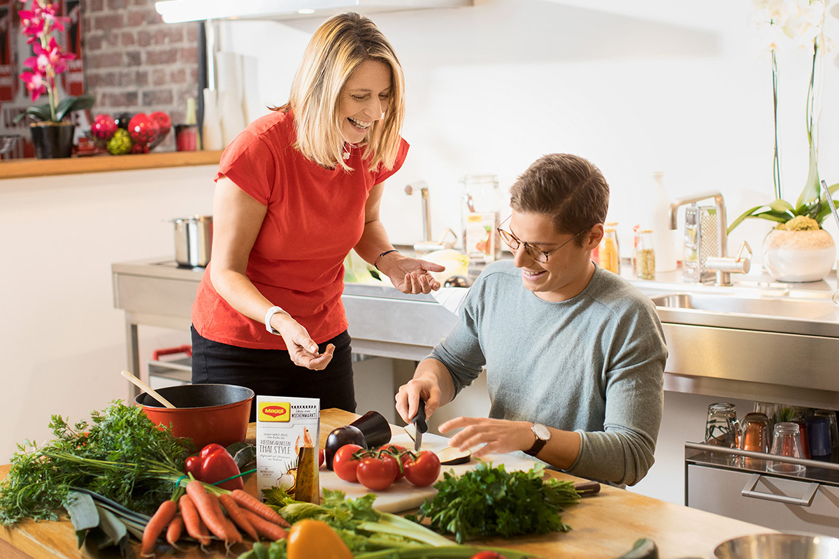 Couple cooking with Maggi