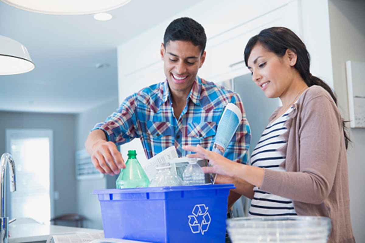 Family recycling bottles