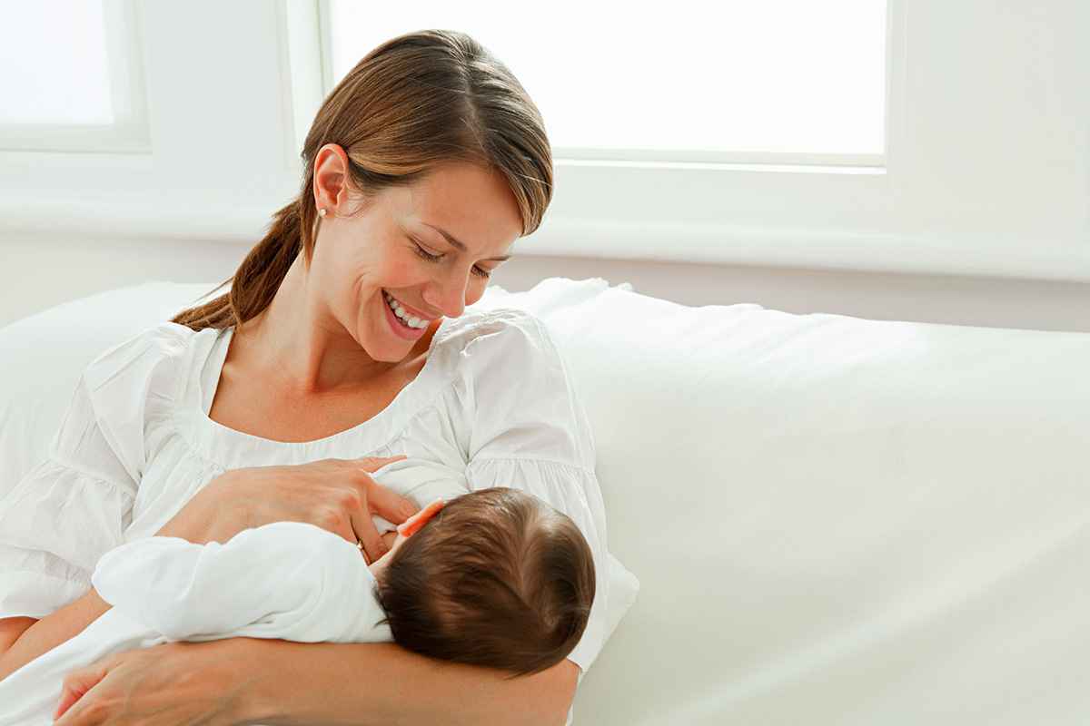 Mother breastfeeding baby