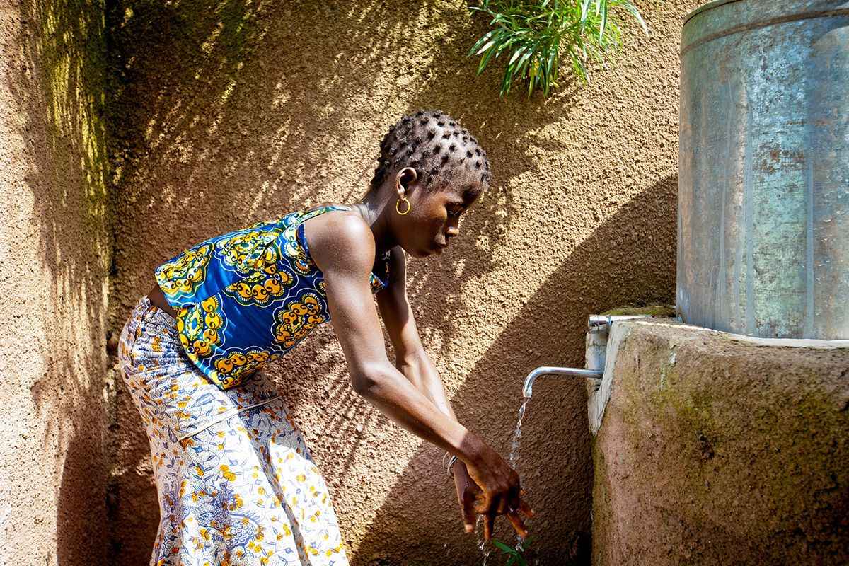 Girl washing hands