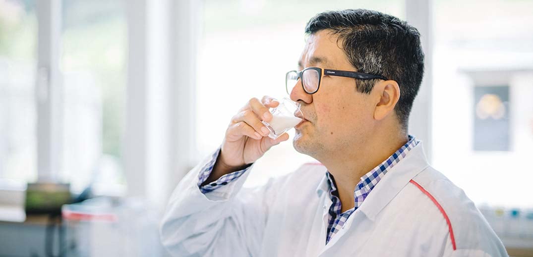 Scientist checking milk sample