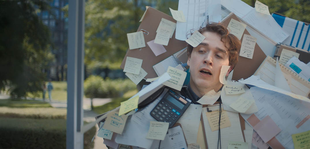 Man with sticky notes on him