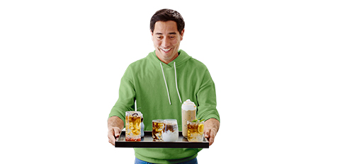 Person holding tray of assorted iced beverages