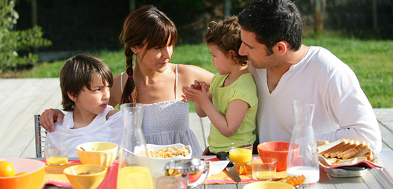 family eating healthy breakfast