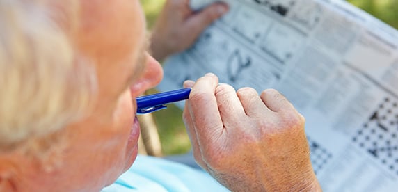man reading a newspaper