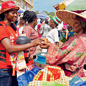 My own business - MYOWBU woman is selling coffee on a street
