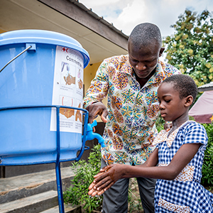 Girl washing hands Girl washing hands