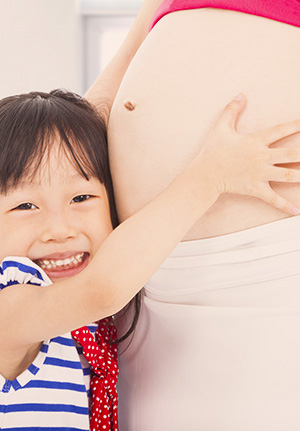 pregnant woman with girl