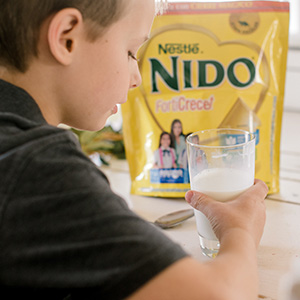 boy drinking Nido boy drinking Nido