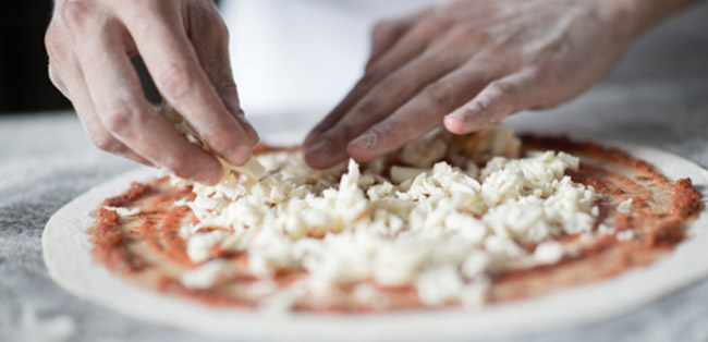 Preparing a pizza pizza-making.jpg
