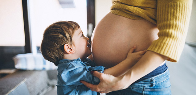 pregnant woman with son