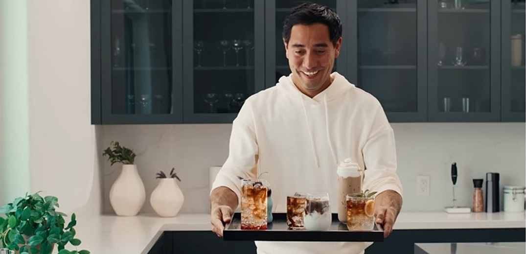 Nescafé iced coffee drinks served on a tray in a modern kitchen setting