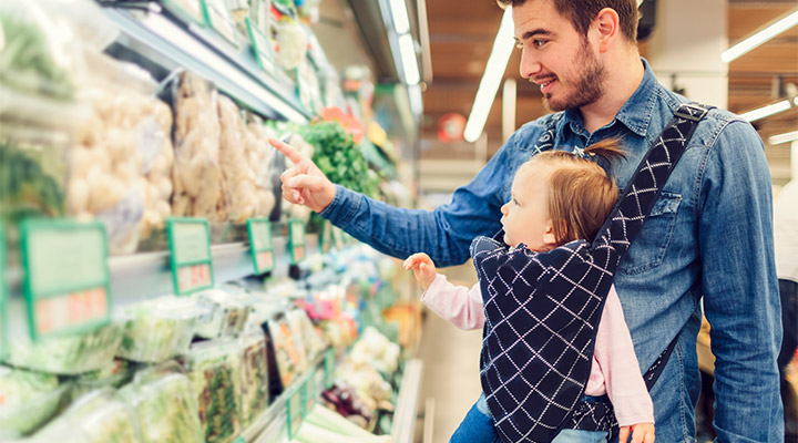 Man and baby shopping