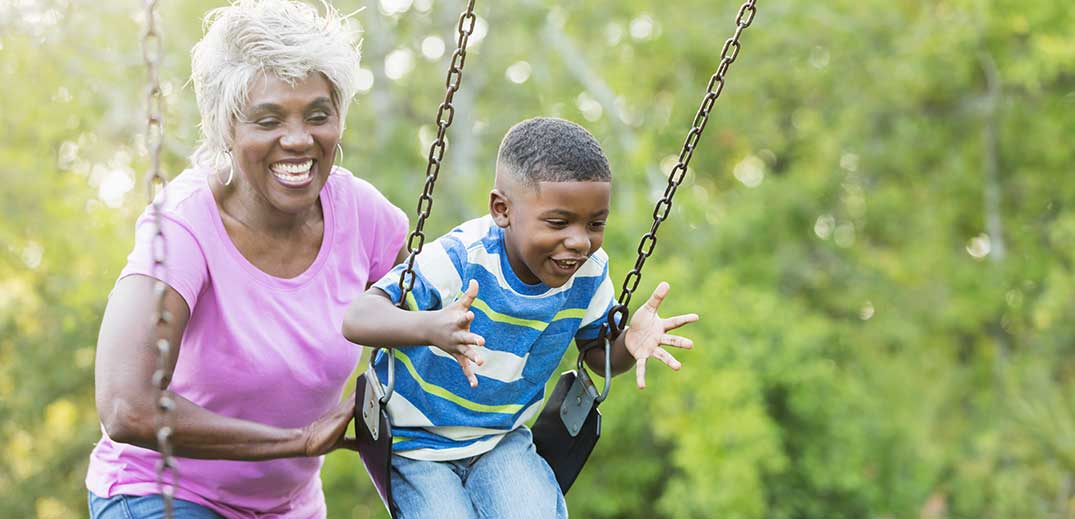 Grandma and grandson on swing