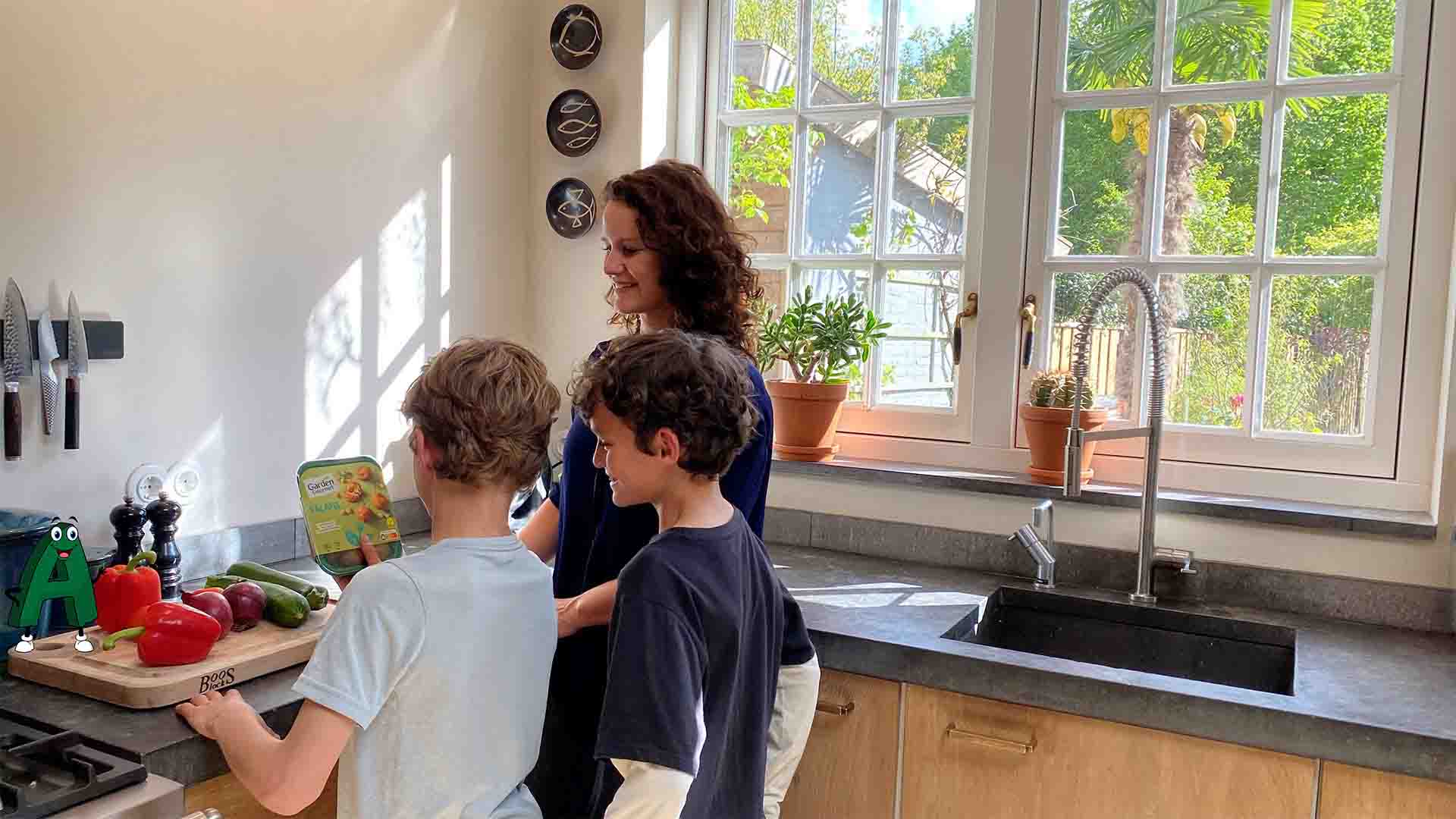 Mom and two boys are cooking