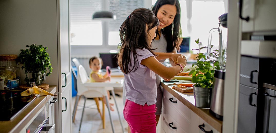 Mom cooking with daughter Mom cooking with daughter