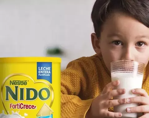 Boy drinking Nido milk