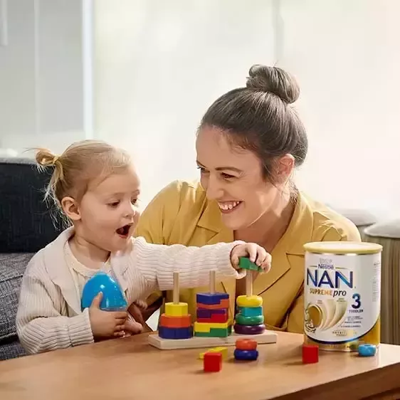 Mother and daughter playing