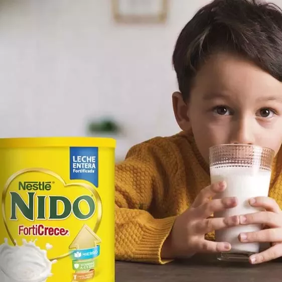 Boy drinking Nido milk