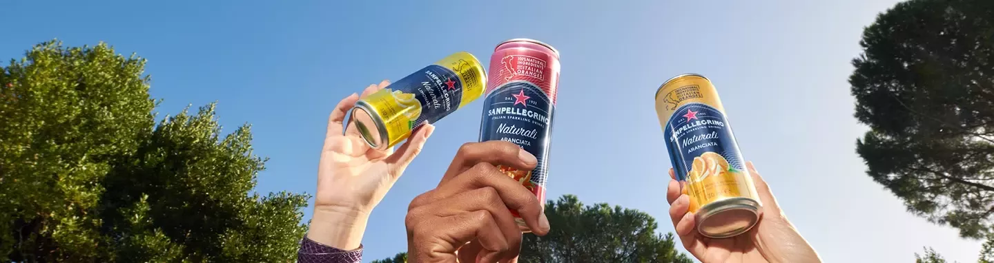 hands holds the Sanpellegrino jars