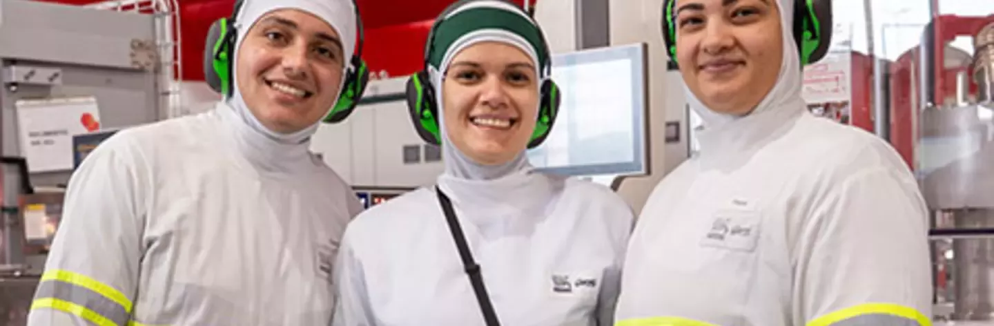 Factory workers smiling