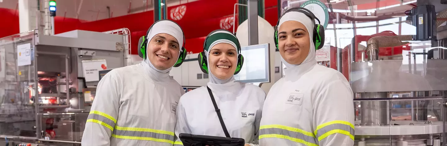 Factory workers smiling