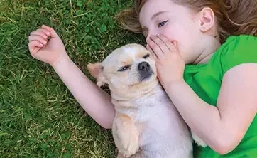 a girl with dog