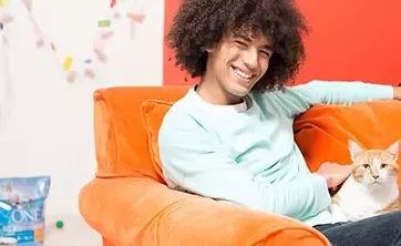 Man sitting with his cat
