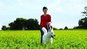 Woman walking with her dog
