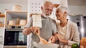 Elder couple cooking
