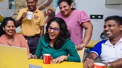employees discussing with student