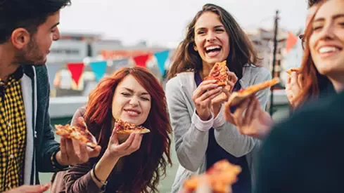 friends sharing a pizza