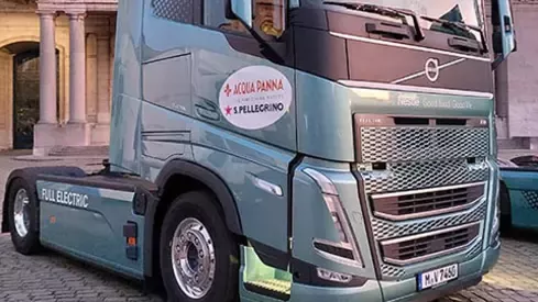 Electric delivery truck transporting Acqua Panna and S.Pellegrino bottled water