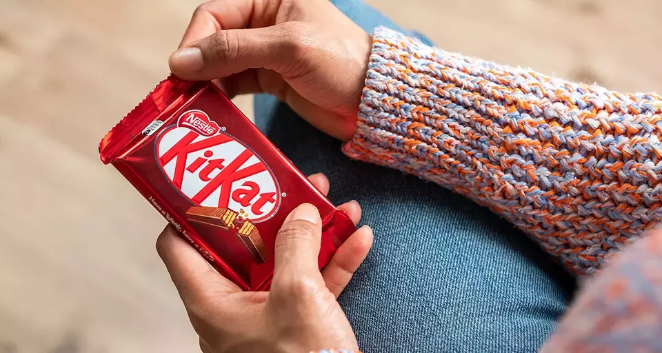 Person holding KitKat