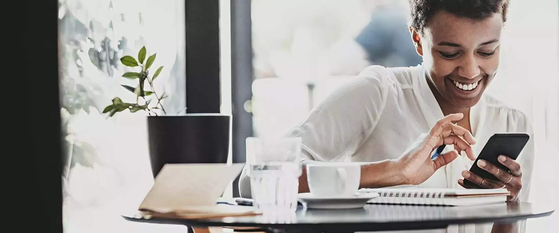 Woman checking news on her phone