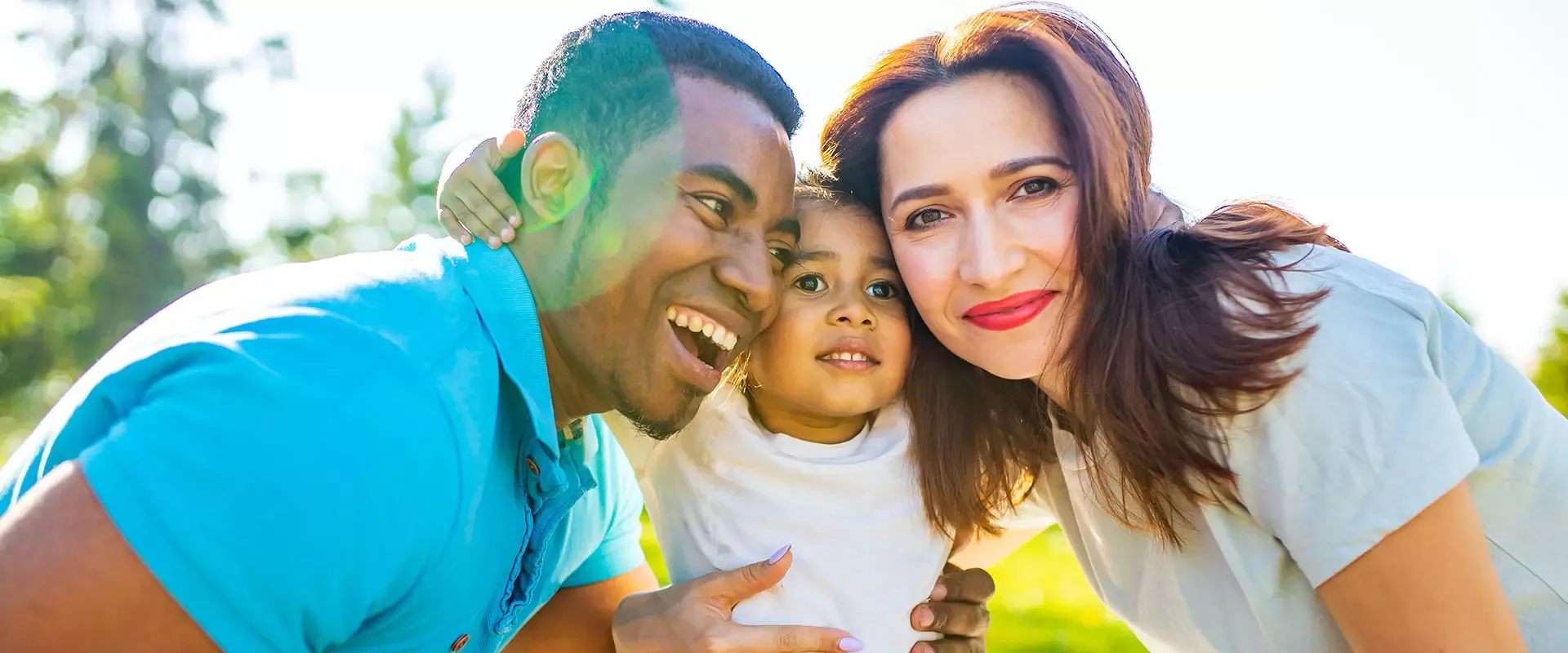 Family with small girl in the middle