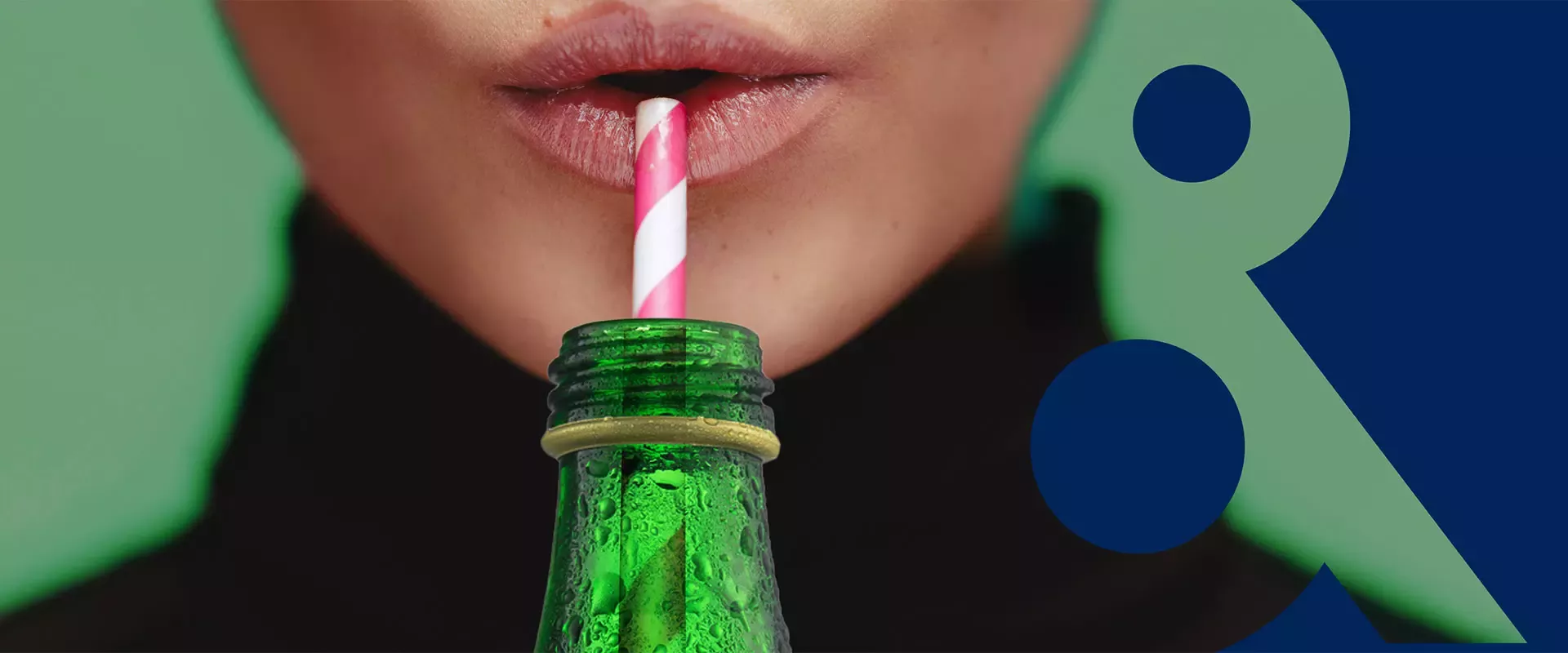 Close-up of sparkling water bottle with straw highlighting refreshing hydration