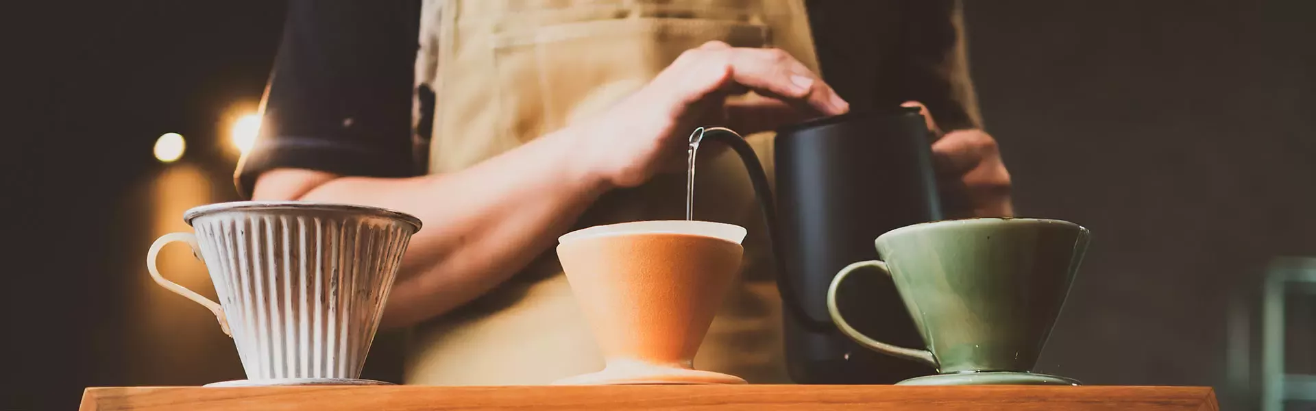 Barista makes coffee