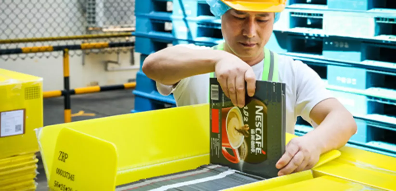 Person in packaging production line