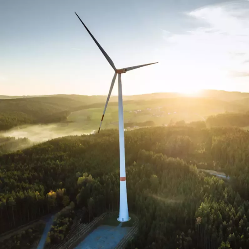 Wind turbine with sunset